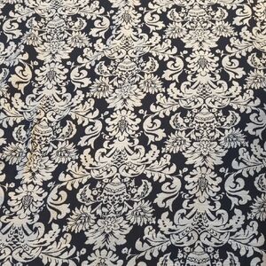Elegant Black and Cream Damask Fabric